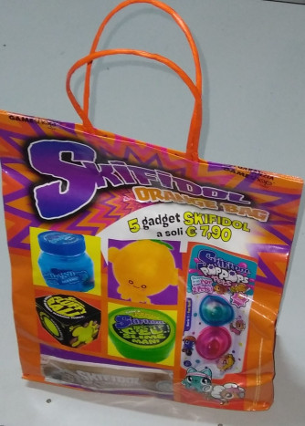 Busta sorprese SKIFIDOL Orange BAG - c/5 gadget della famiglia SKIFIDOL